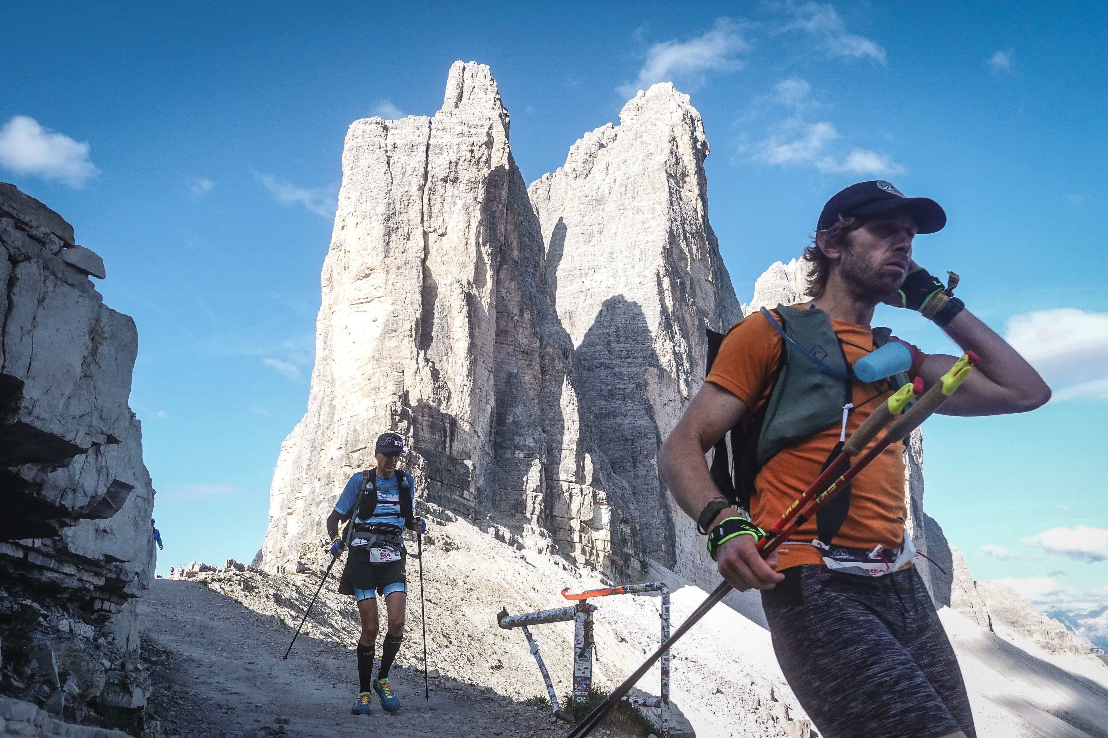 Trail runner in the mountains at sunrise